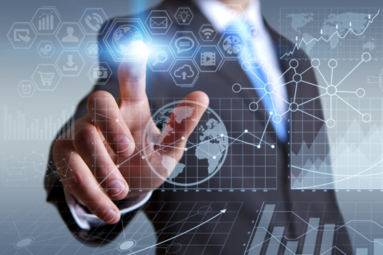 Businessman in his office during a presentation with charts screens