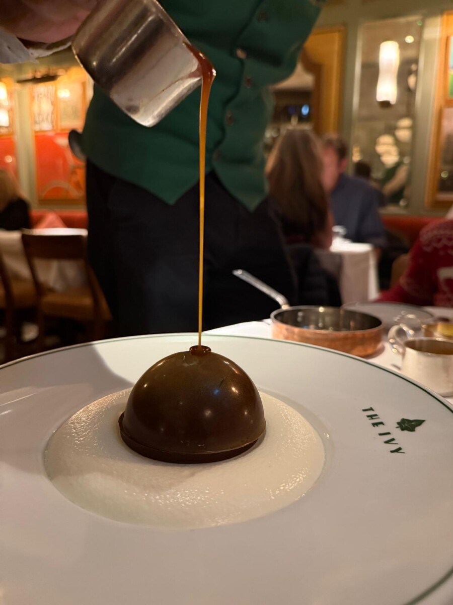 The Ivy Chocolate Bombe Christmas dessert at The Ivy Cafe Marylebone